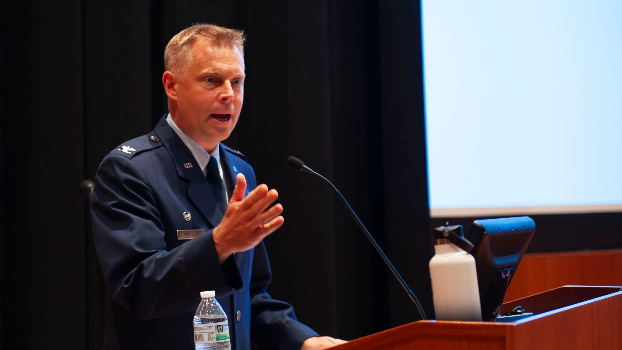 Col. Burgess at podium