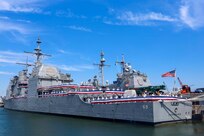 Sailors man the rails during the decommissioning ceremony of the guided-missile cruiser USS Vicksburg (CG 69), June 28,