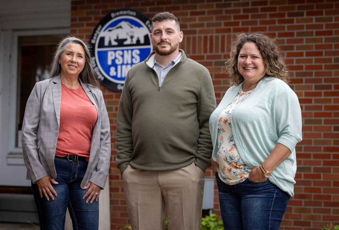 The three-person Puget Sound Naval Shipyard & Intermediate Maintenance Facility Command Career Center team includes (from left) Heidi Anderson, Command Career Counselor lead, John Smith, office manager, and Rozy Castellanos, career counselor. (U.S. Navy photo by Wendy Hallmark)