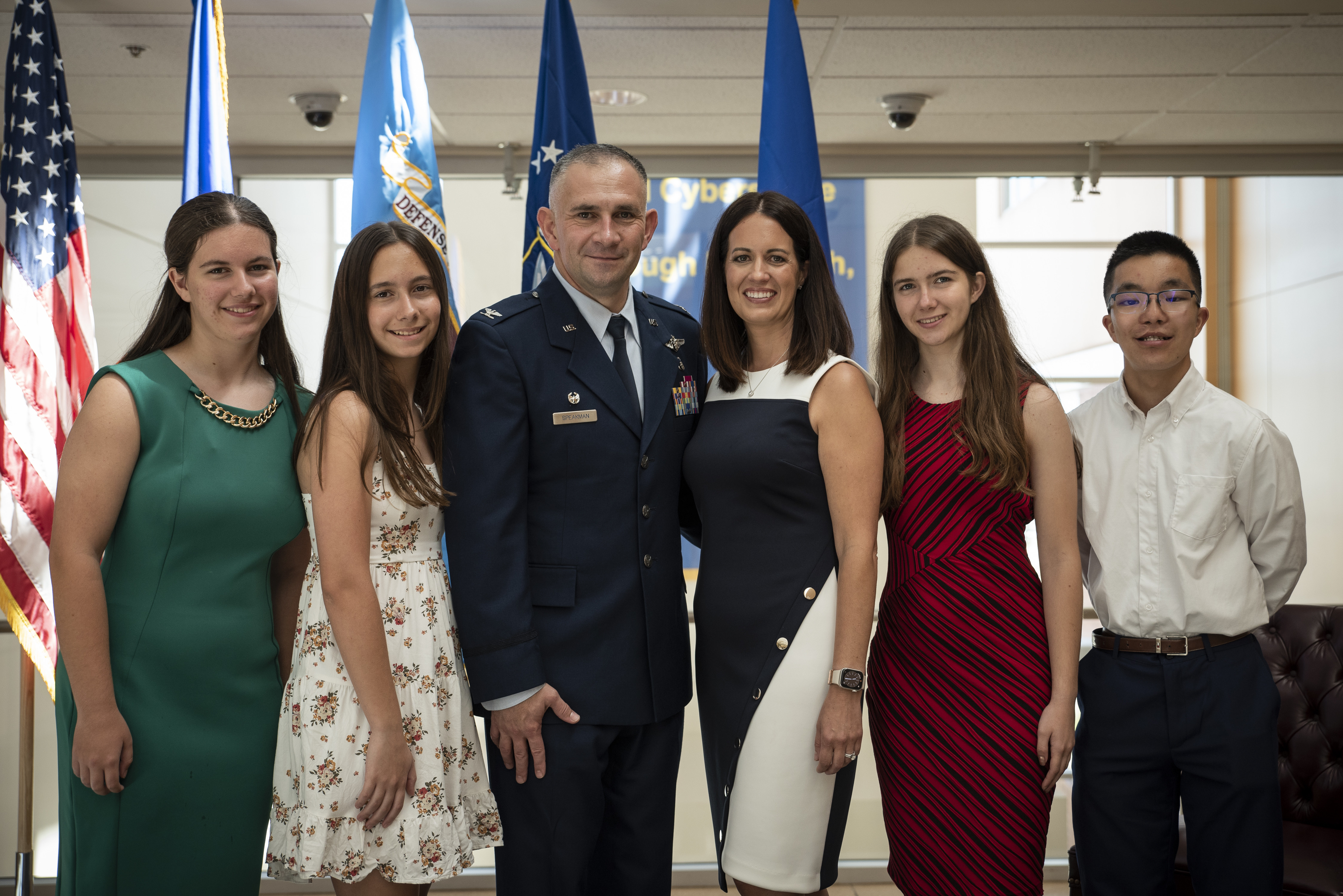 United States Air Force School of Aerospace Medicine, or USAFSAM, Commander Col. (Dr.) Richard O. Speakman stands for a family photo with his spouse and four children shortly after assuming official command of USAFSAM at a ceremony at Wright-Patterson Air Force Base, Ohio, July 2, 2024. In his first remarks as USAFSAM’s newest commander, Speakman thanked his family for their support, service and patriotism. “There is a cost to service,” Speakman said, addressing his family, “and I don't forget that, together, we serve as Team Speakman.” (U.S. Air Force photo / Rick Eldridge)