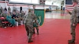 Officers case the colors of the 5th Military Police Battalion (CID) in Kaiserslautern, Germany, May 1, 2024. (Army photo by Thomas B . Hamilton III)