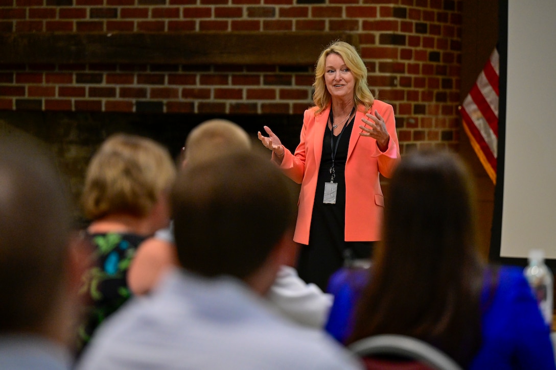 Acquisition executive speaks to audience