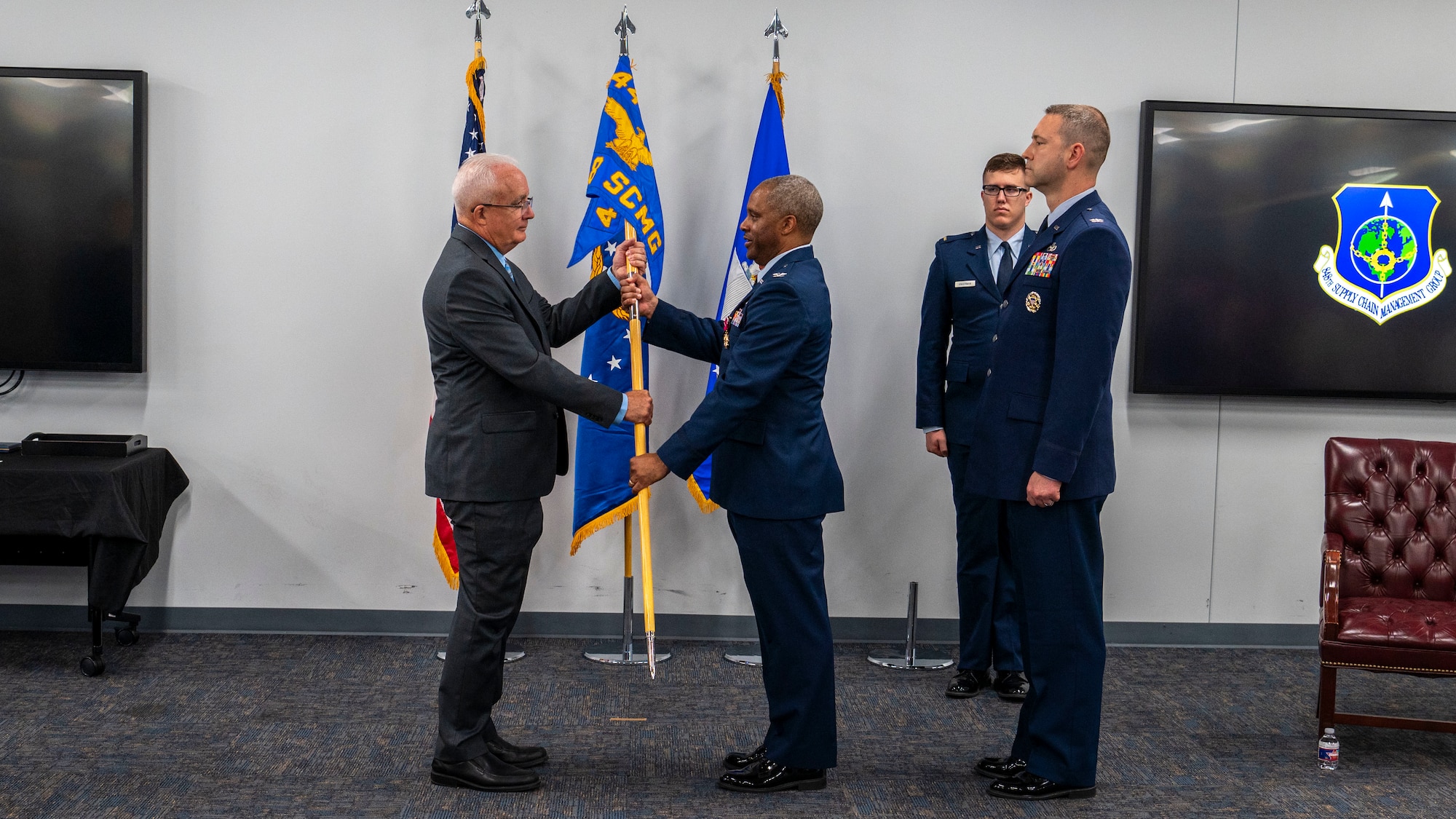 Col. Brandon gives guidon to presiding officer