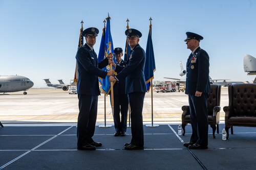 A guidon is passed to the new commander