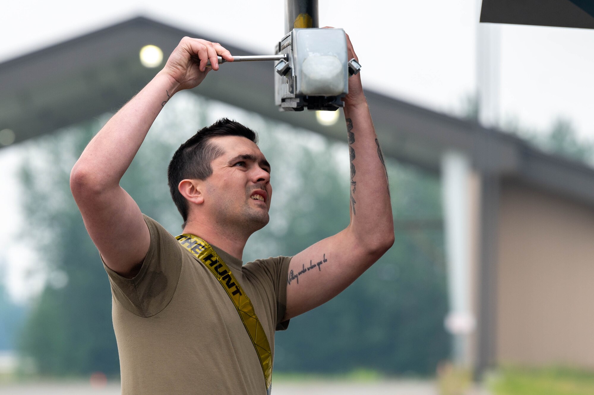 U.S. Air Force Airman 1st Class Zack Haskell, 18th Fighter Generation Squadron load crew team member, prepares a fighter jet for munitions during a load competition at Eielson Air Force Base, Alaska, July 3, 2024.
