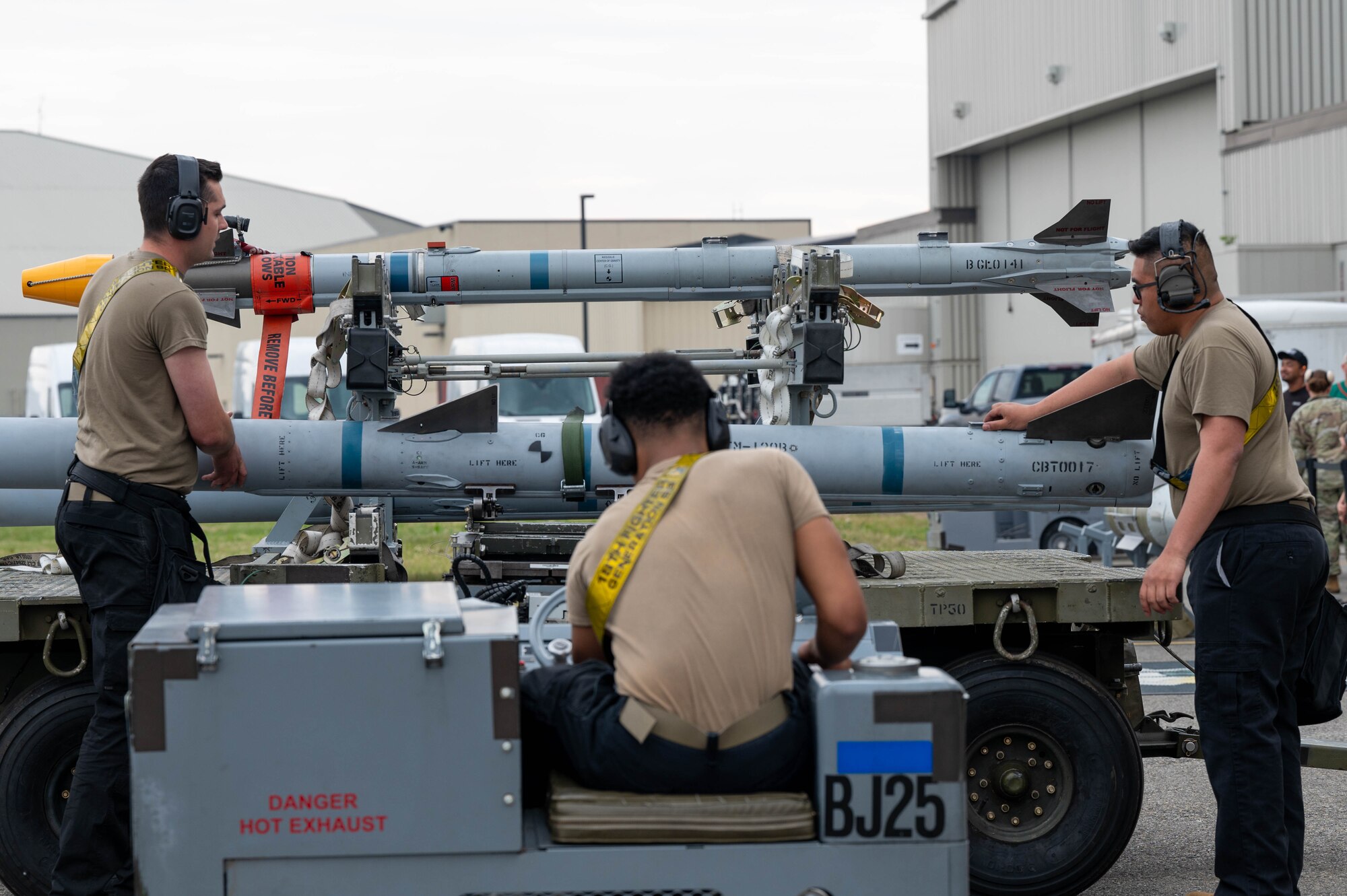 Airmen assigned to the 18th Fighter Generation Squadron prepare munitions for loading during a load competition at Eielson Air Force Base, Alaska, July 3, 2024.