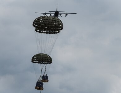 A U.S. Air Force C-130J Super Hercules assigned to the 374th Airlift Wing, Yokota Air Base, Japan, delivers pallet drops over a designated landing zone near Yeoju, Republic of Korea, June 25, 2024.