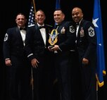 2024 AFRC First Sgt of the Year — SMSgt Nicholas Ortiz, HQ AFRC, center.