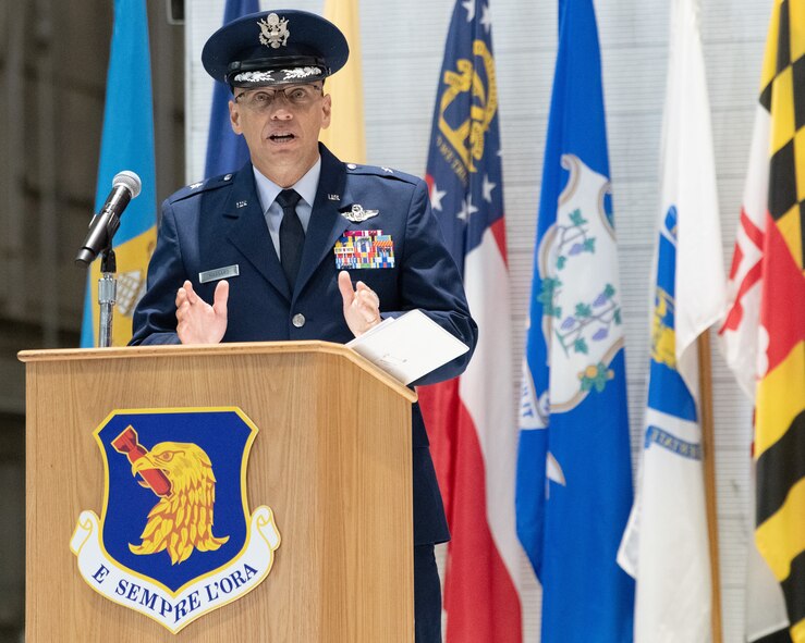 Brig. Gen. Mark Massaro speaks during his change of command ceremony inside the McKinley Climatic Lab at Eglin Air Force Base, Fla., 2024.
