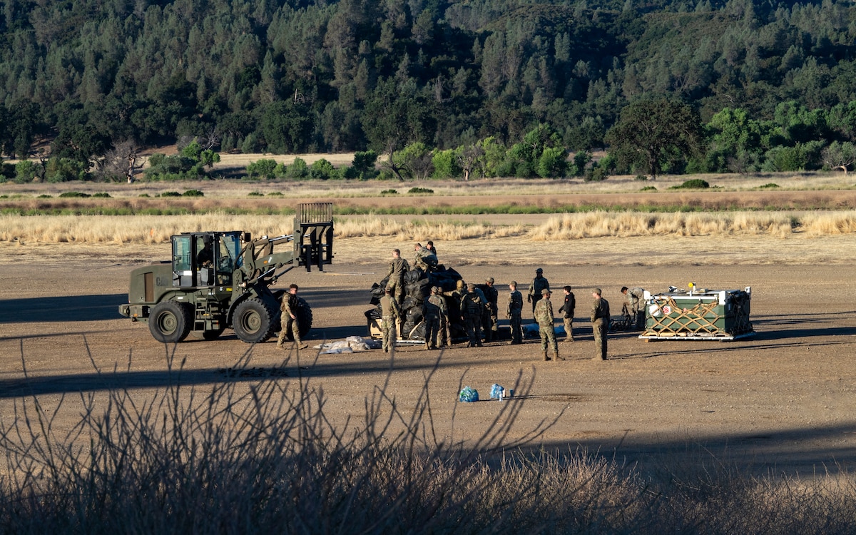 Airmen with the 821st Contingency Response Squadron pack up their tactical operations area equipment during Exercise STORM CROW, at Fort Hunter-Liggett, California, June 28, 2024.