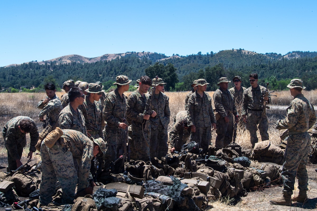 U.S. Marine Corps Marines with the V17 Suicide Charley Company perform an accountability formation during Exercise STORM CROW at Schoonover Airfield, Jolon, California, June 26, 2024.