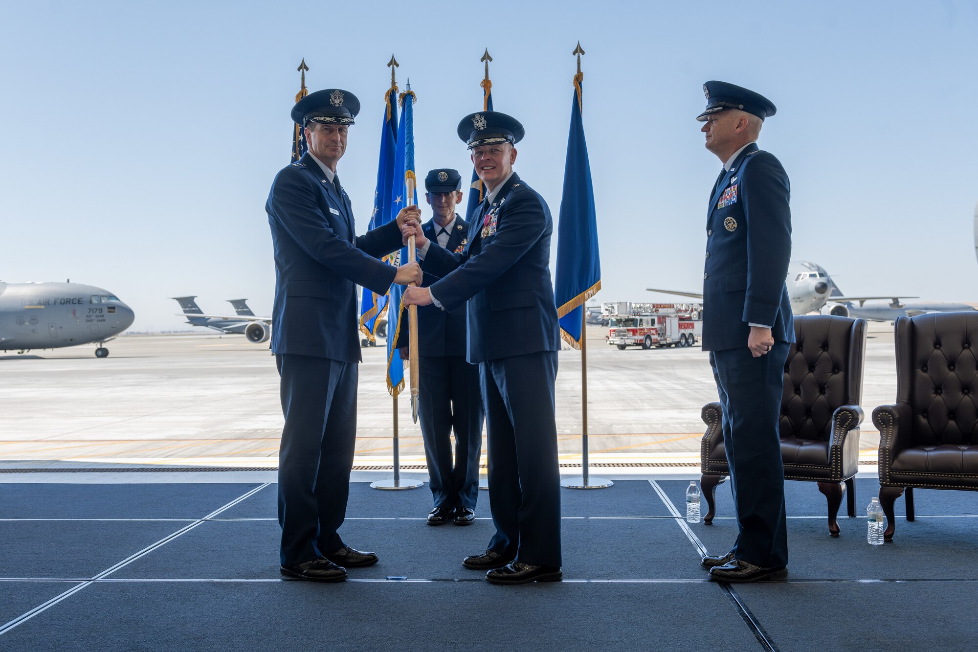The guidon is passed to the 18th AF/CC