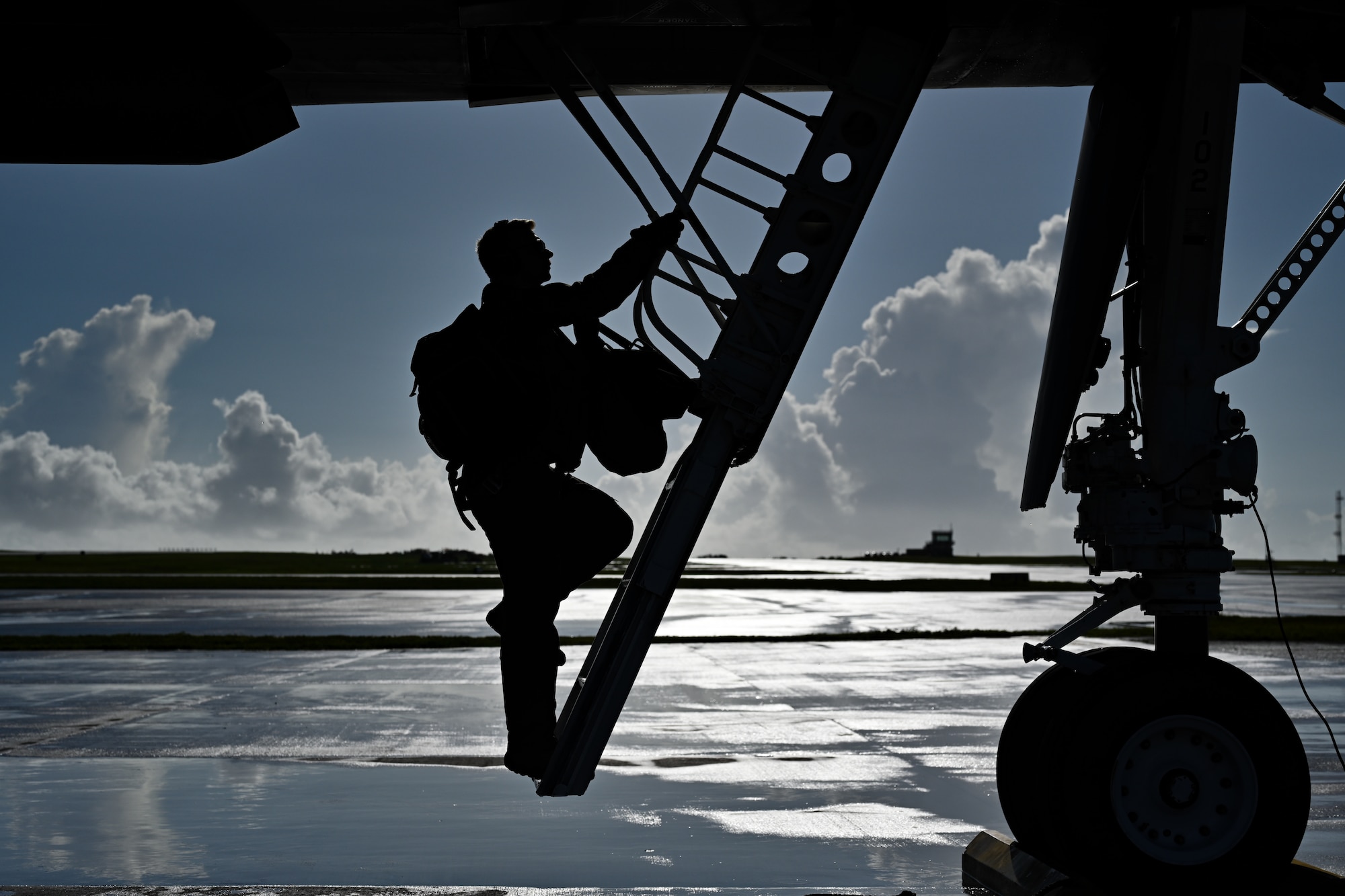 A U.S. Air Force B-1B Lancer pilot assigned to the 37th Expeditionary Bomb Squadron from Ellsworth Air Force Base, South Dakota, climbs a ladder before takeoff at Andersen Air Force Base, Guam, June 13, 2024, in support of a Bomber Task Force 24-6 mission. BTF missions are designed to showcase PACAF’s ability to deter, deny, and dominate any influence or aggression from adversaries or competitors. (U.S. Air Force photo by Staff Sgt. Jake Jacobsen)