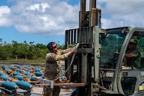 U.S. Air Force Staff Sgt. Devin Evangelista, 28th Aircraft Maintenance Squadron load crew team member prepares to load a joint direct attack munition GBU-38s onto a forklift at Andersen Air Force Base, Guam, June 14, 2024, in support of a Bomber Task Force mission. Our vision of the Indo-Pacific is a free and open region comprised of nations that adhere to the international rules-based order. (U.S. Air Force photo by Airman 1st Class Audree Campbell)