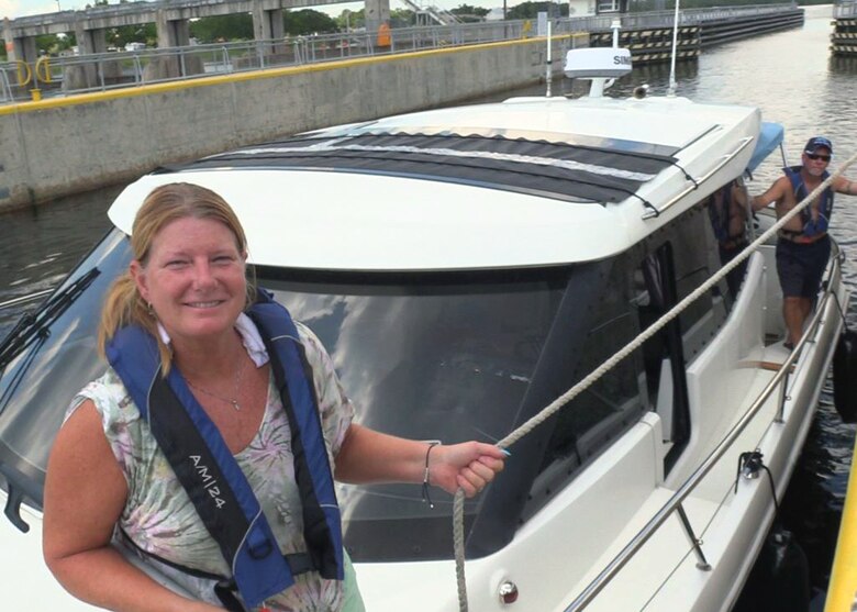 Kelly and Jeff Funk lock through the W.P. Franklin Lock and Recreation area. They traveled the Caloosahatchee river and through the Lake Okeechobee Waterway to the Atlantic Ocean. (USACE photo by Mark Rankin)