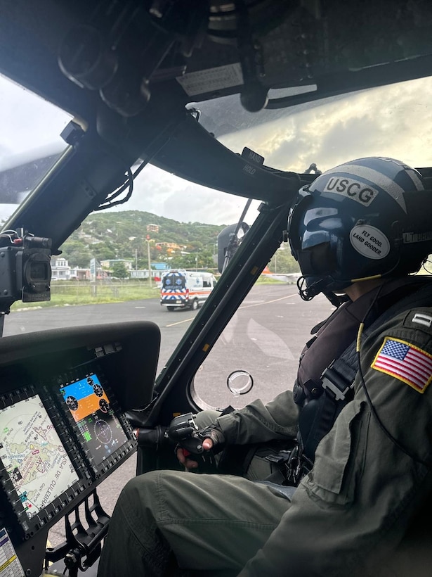 A Coast Guard Air Station Borinquen MH-60T Jayhawk helicopter aircrew hoisted a 35-year-old woman, who became stranded after falling off the rocks and sustaining and ankle injury on Tórtolos Beach in Culebra, Puerto Rico, July 4, 2024.  The woman was transported to the local airport in Culebra, where awaiting emergency medical personnel received and transported her to a local medical facility. (U.S. Coast Guard photo)