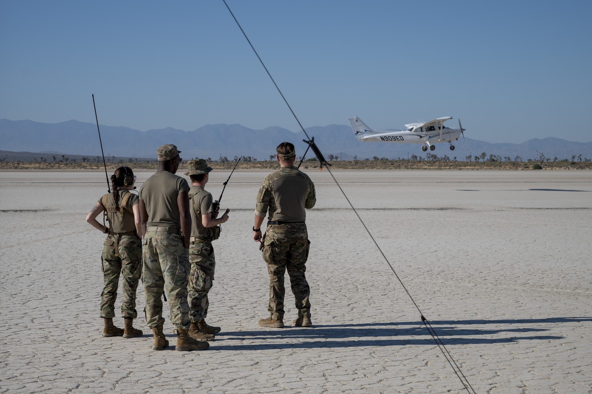 Airmen from the 9th Operations Support Squadron from Beale Air Force Base trains air traffic operations in a forward-deployed location with two Cessna airplanes from the Edwards Aero Club on Rodgers Dry Lake at Edwards AFB, California, June 6. Rogers Dry Lake continues to be used by Edwards AFB to provide training opportunities in austere environments and as an emergency landing site for both air and spacecraft.