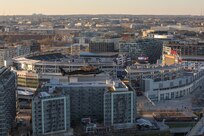 An Army VH-60M "gold top" Black Hawk helicopter flies near Washington Nationals Park in Washington, D.C.
