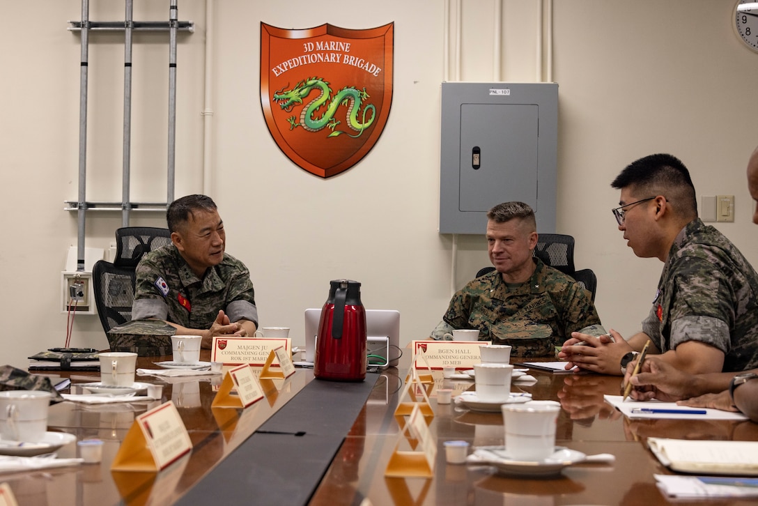 U.S. Marine Corps Brig Gen. Trevor Hall, right, deputy commanding general of III Marine Expeditionary Force speaks with Republic of Korea Marine Maj. Gen. Il-Suk Ju, commanding general of 1st ROK Marine Division during an office call on Camp Courtney, Okinawa, Japan, July 1, 2024. The visit allowed ROK and III MEF leadership the ability to discuss important topics to enhance operational capabilities and strengthening the ROK-U.S. alliance. (U.S. Marine Corps photo by Staff Sgt. Megan Roses)