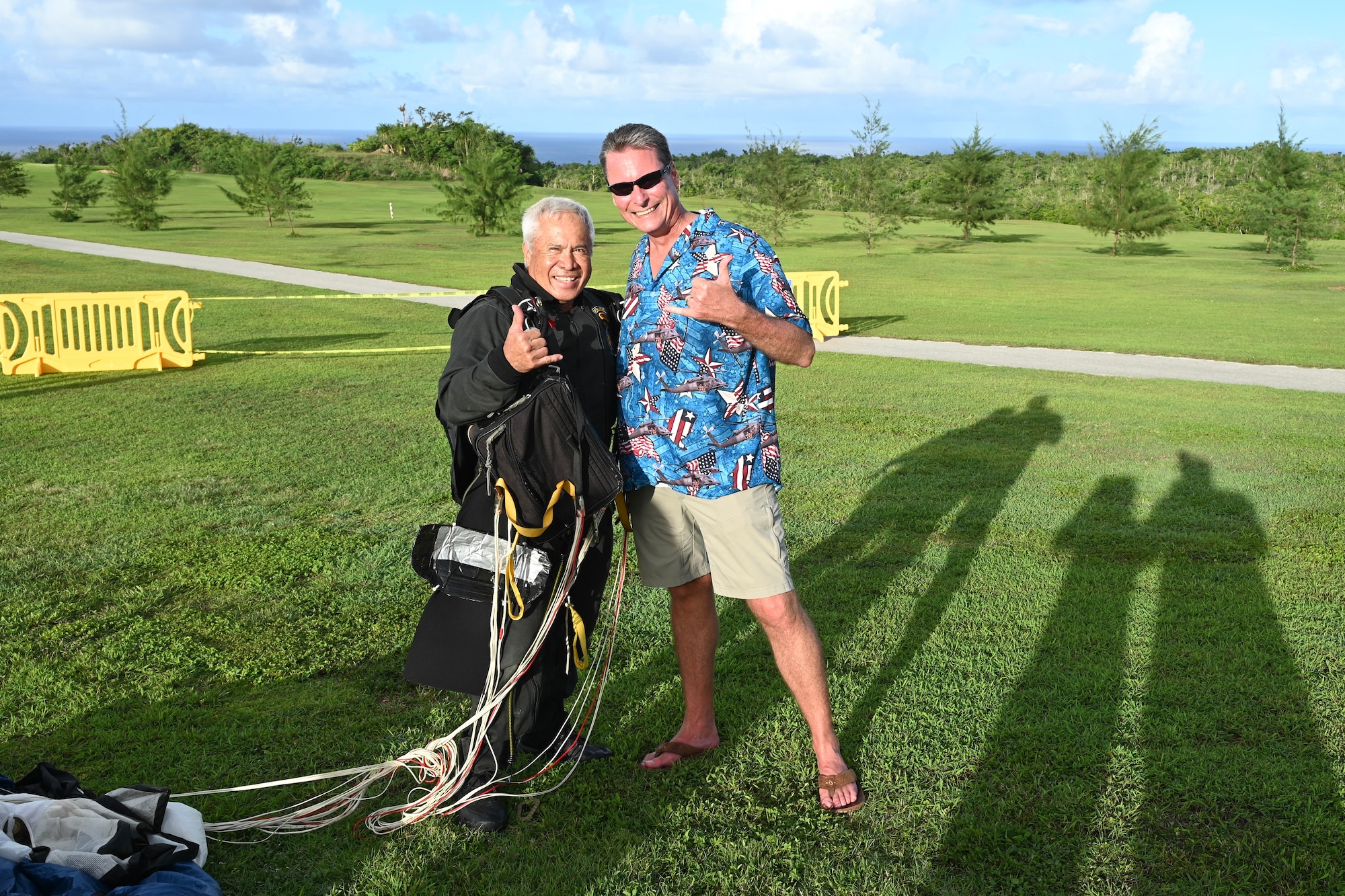 The U.S. Air Force 36th Wing commander takes a photo with a retired U.S. Army special forces soldier.