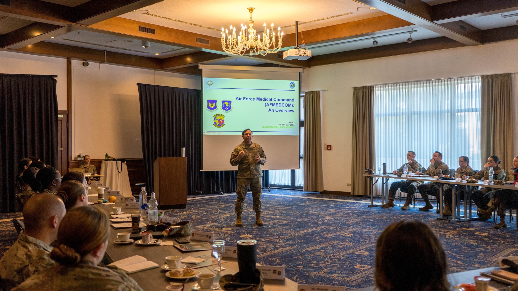 Col Jay Veeder, HQ USAFE-AFAFRICA Deputy Command Surgeon, providing information on an Air Force Medical Command