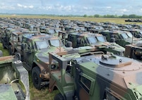 A formation of Joint Light Tactical Vehicles is lined up at the Coleman Army Prepositioned Stocks-2 worksite in Mannheim, Germany, the first APS-2 site in the world to receive JLTVs. Army Field Support Battalion-Germany assumed mission command of the Coleman APS-2 worksite July 8 in the final step of the 405th Army Field Support Brigade’s multi-year regional alignment and transformation initiative.