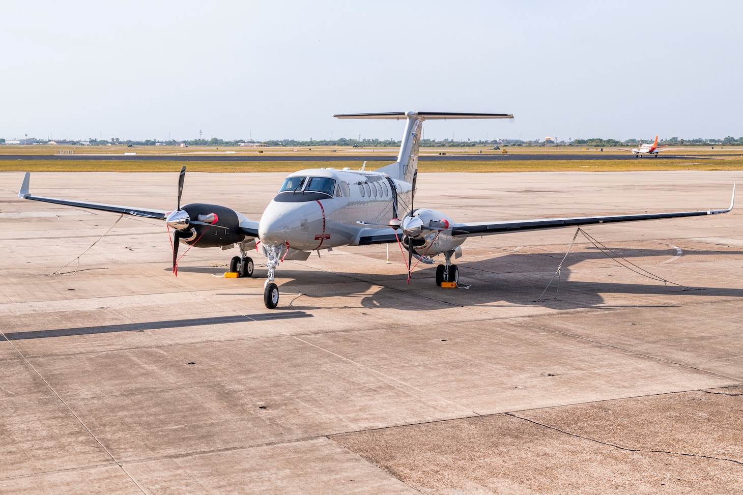 A T-54 multi-engine aircraft sits on the flightline of Naval Air Station (NAS) Corpus Christi, April 18. The arrival of the T-54A heralds a new generation of Naval Aviators who will use the trainer to earn their wings of gold as they prepare to fly such aircraft as the P-8A Poseidon, E-2D Hawkeye and C-130 Hercules. The T-54A replaces the T-44C Pegasus, an aircraft that has been in naval service since 1977.