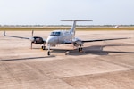 A T-54 multi-engine aircraft sits on the flightline of Naval Air Station (NAS) Corpus Christi, April 18. The arrival of the T-54A heralds a new generation of Naval Aviators who will use the trainer to earn their wings of gold as they prepare to fly such aircraft as the P-8A Poseidon, E-2D Hawkeye and C-130 Hercules. The T-54A replaces the T-44C Pegasus, an aircraft that has been in naval service since 1977.