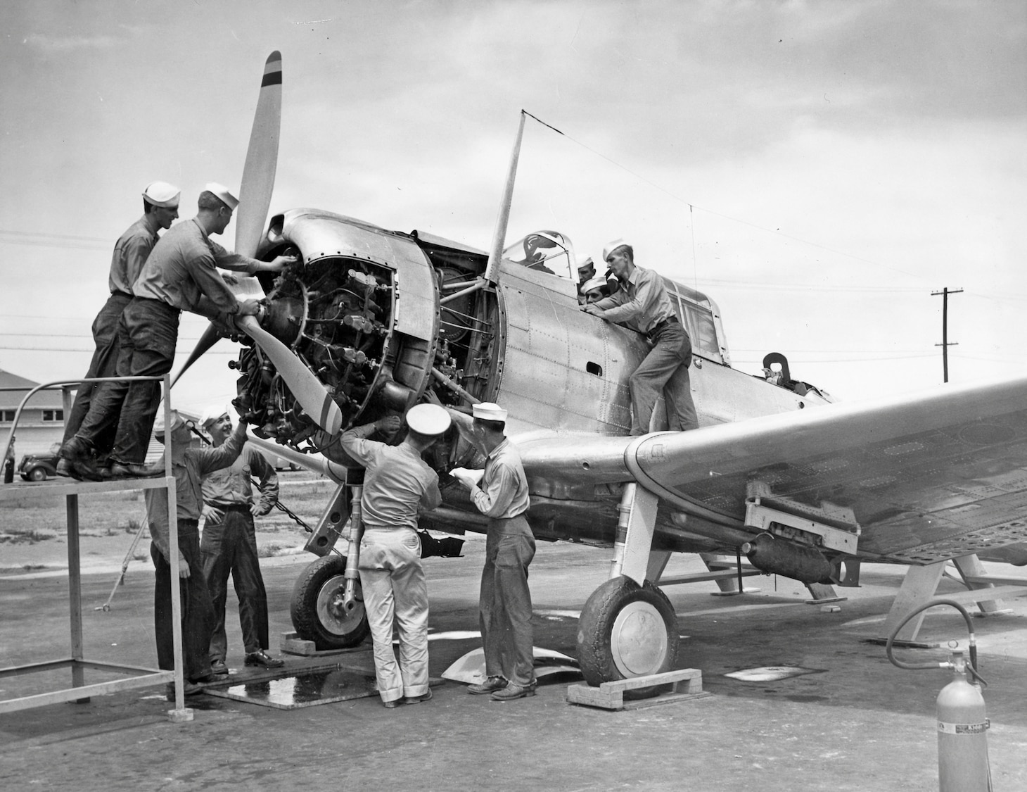 Naval Air Technical Training Center, NAS Memphis - this SBD is completely equipped with guns, radio equipment, etc. and is used for plane familiarization in the ARM school.