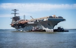 The Nimitz-class aircraft carrier USS John C. Stennis (CVN 74) is moved to an outfitting berth in Newport News, Virginia, April 8, 2024. John C. Stennis is in Newport News Shipbuilding conducting Refueling and Complex Overhaul to prepare the ship for the second half of its 50-year service life.