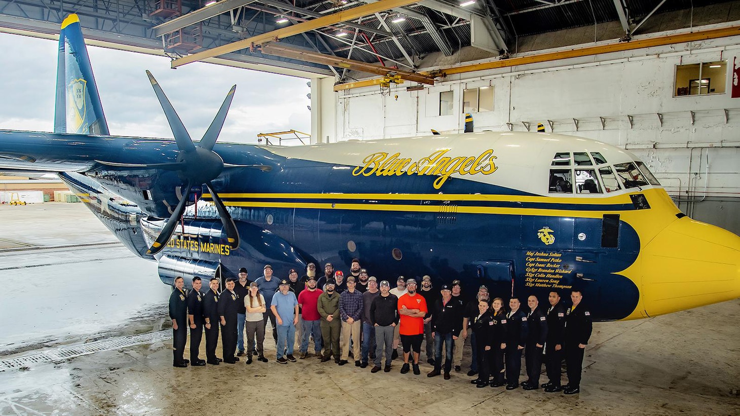 Members of Fleet Readiness Center East’s (FRCE) C-130 Minor Depot Inspection Team stand with the Blue Angels Maintenance Team members in front of Fat Albert, the Blue Angels’ C-130J support aircraft. Fat Albert recently visited FRCE for routine maintenance to ensure mission readiness. The Blue Angels use Fat Albert for transportation to their many airshows throughout the year, and it is the only aircraft of its kind.