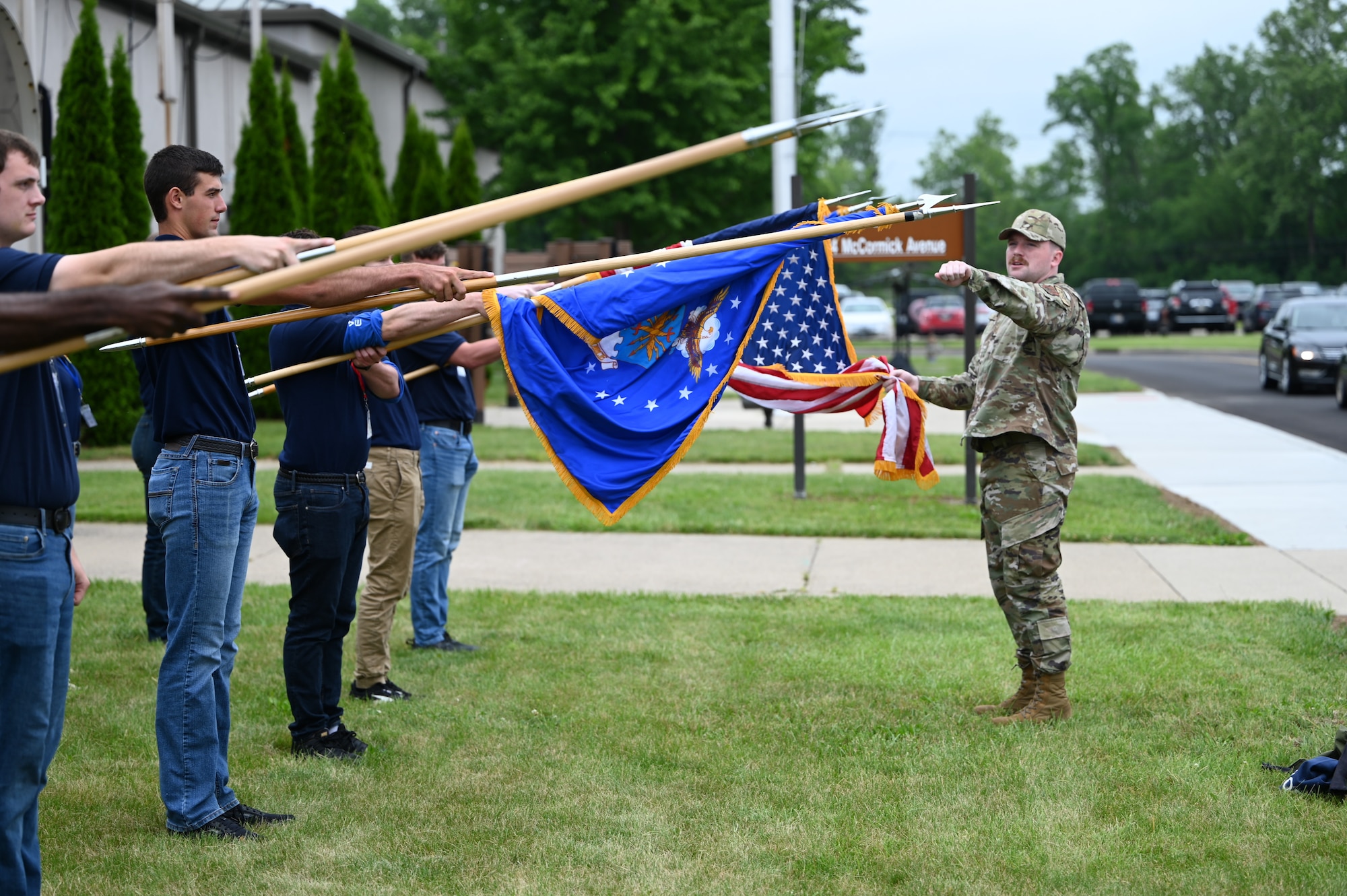 Tech. Sgt. Dustin Seelig, 87th Aerial Port Squadron joint inspection supervisor and a member of the Wright-Patterson Air Force Base Honor Guard, teaches members of the 445th Airlift Wing Development and Training Flight how to present the Colors during the June 2, 2024 unit training assembly.