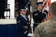 U.S. Air Force Airman Marianna Alcauter, 5th Logistics Readiness Squadron fuels distribution operator (left), presents the colors during a retirement ceremony at Minot Air Force Base, North Dakota, July 3, 2024. The Minot AFB Honor Guard serves a distinct mission under unique conditions from performing military honors North Dakota to presenting colors on base. (U.S. Air Force photo by Airman 1st Class Luis Gomez)