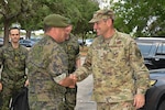 16th Air Force and Finnish leadership shake hands