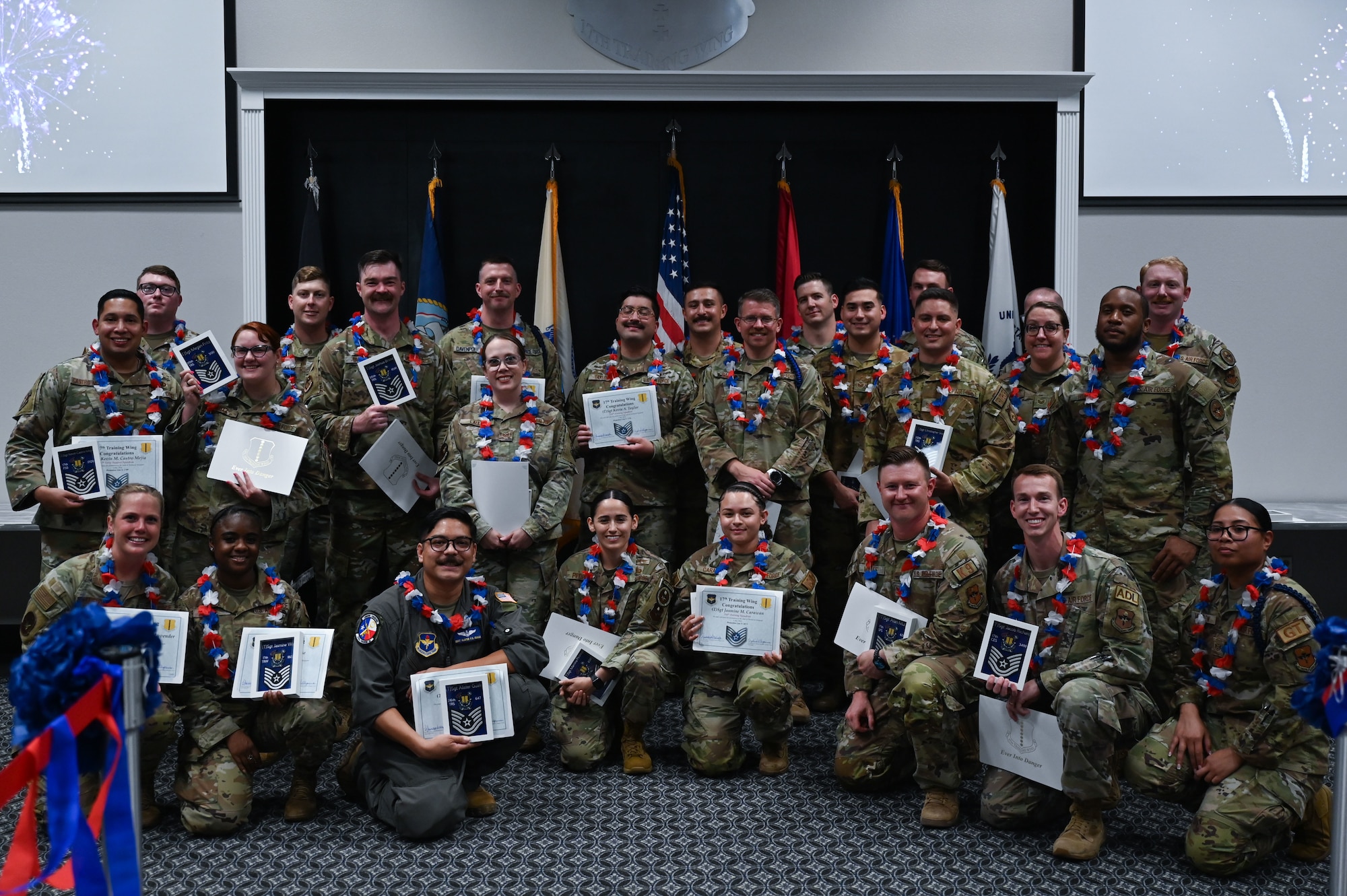 U.S. Air Force Tech. Sgt. selects assigned to Goodfellow pose for a group photo during a Tech. Sgt. Release Party at the Powell Event Center, Goodfellow Air Force Base, Texas, July 3, 2024. It is common for selects to celebrate together as they progress their Air Force careers further into the next rank. (U.S. Air Force photo by Airman 1st Class Brian Lummus)