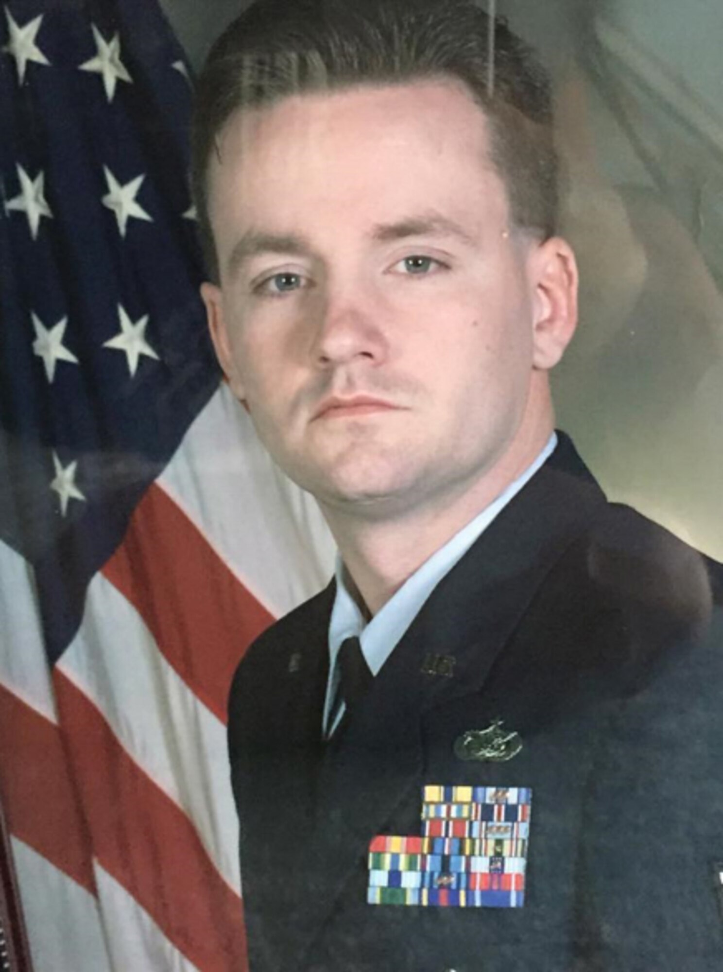 Official portrait of U.S. Air Force Lt. Col. David Richardson, commander of Air Force ROTC Detachment 025 at Arizona State University, during his time as an enlisted member. During his enlisted years, he was assigned to a variety of positions, including law enforcement, desk sergeant and flight chief. (Courtesy photo)