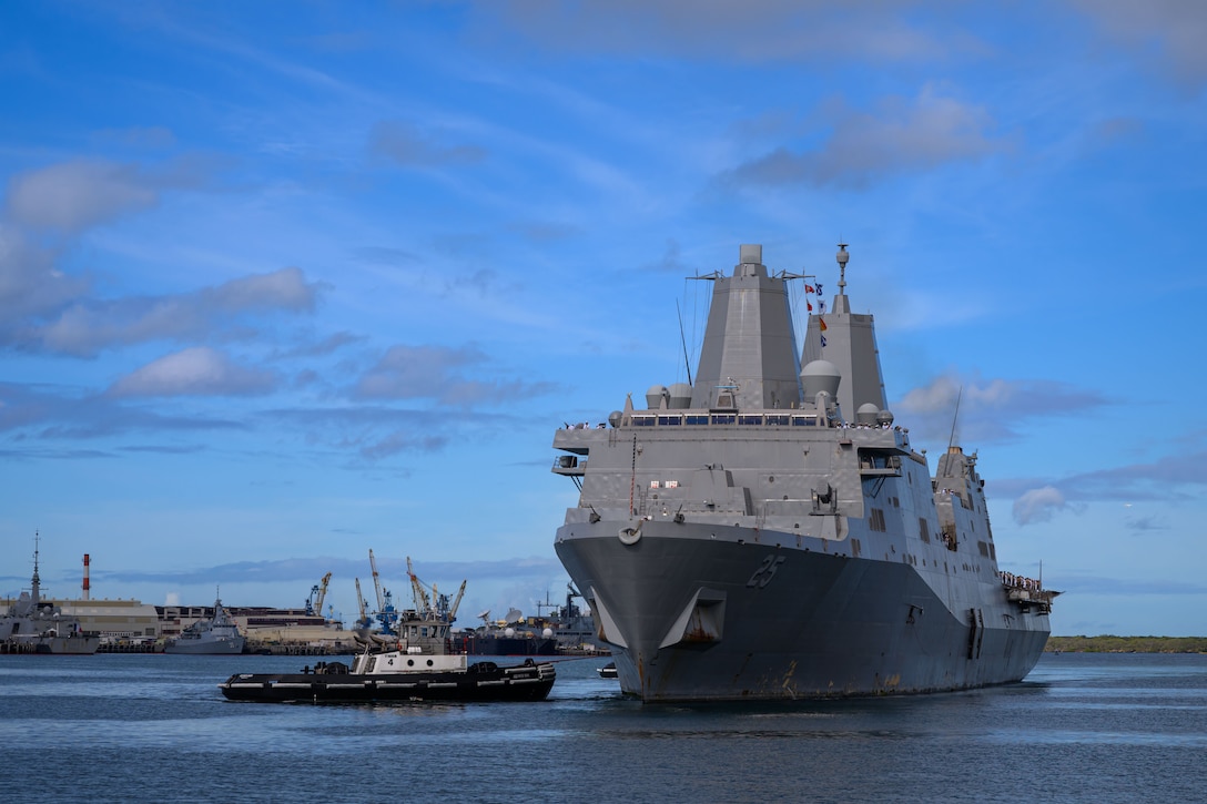 The San Antonio-class amphibious transport dock ship USS Somerset (LPD 25) arrives at Joint Base Pearl Harbor-Hickam for Exercise Rim of the Pacific (RIMPAC) 2024, July 3. Twenty-nine nations, 40 surface ships, three submarines, 14 national land forces, more than 150 aircraft and 25,000 personnel are participating in RIMPAC in and around the Hawaiian Islands, June 27 to Aug. 1. The world’s largest international maritime exercise, RIMPAC provides a unique training opportunity while fostering and sustaining cooperative relationships among participants critical to ensuring the safety of sea lanes and security on the world’s oceans. RIMPAC 2024 is the 29th exercise in the series that began in 1971. (U.S. Navy photo by Mass Communication Specialist 1st Class Jesse Monford)