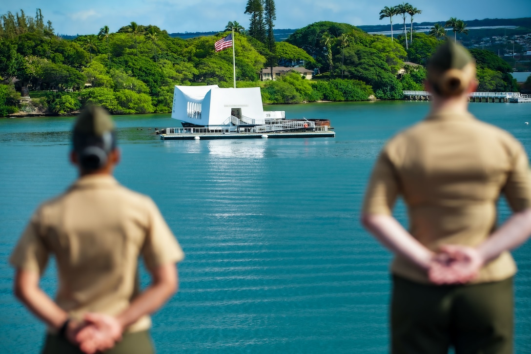 U.S. Marines assigned to the 15th Marine Expeditionary Unit man the rails as the amphibious transport dock USS Somerset (LPD 25) sails by the USS Arizona Memorial pulling into port for Exercise Rim of the Pacific 2024 in at Joint Base Pearl Harbor-Hickam, Oahu, Hawaii July 3, 2024. Twenty-nine nations, 40 surface ships, three submarines, 14 national land forces, more than 150 aircraft and 25,000 personnel are participating in RIMPAC in and around the Hawaiian Islands, June 27 to Aug. 1. The world's largest international maritime exercise, RIMPAC provides a unique training opportunity while fostering and sustaining cooperative relationships among participants critical to ensuring the safety of sea lanes and security on the world's oceans. RIMPAC 2024 is the 29th exercise in the series that began in 1971. (U.S. Marine Corps photo by 1st Lt. Robert Nanna)