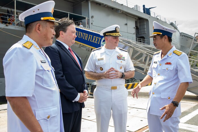 U.S. Ambassador to Vietnam, the Hon. Mr. Marc Knapper, center-left, and U.S. Navy Vice Adm. Fred Kacher, commander, U.S. 7th Fleet, meet with senior leaders from the Vietnam People's Navy following the ship’s arrival to Cam Ranh International Port, July 8, 2024.