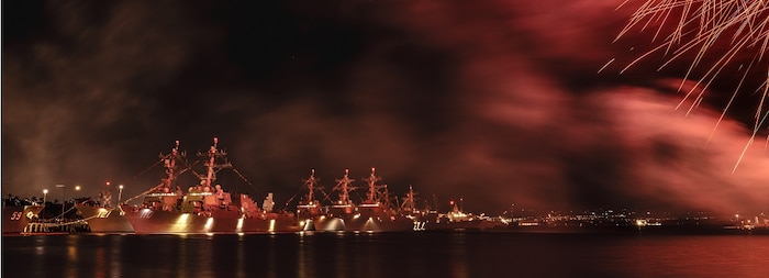 U.S. Navy Arleigh Burke-class guided-missile destroyers; USS Frank E. Petersen Jr. (DDG 121), USS William P. Lawrence (DDG 110), USS Kidd (DDG 100) and USS Sterett (DDG 104) during a Fourth of July celebration at Joint Base Pearl Harbor-Hickam.