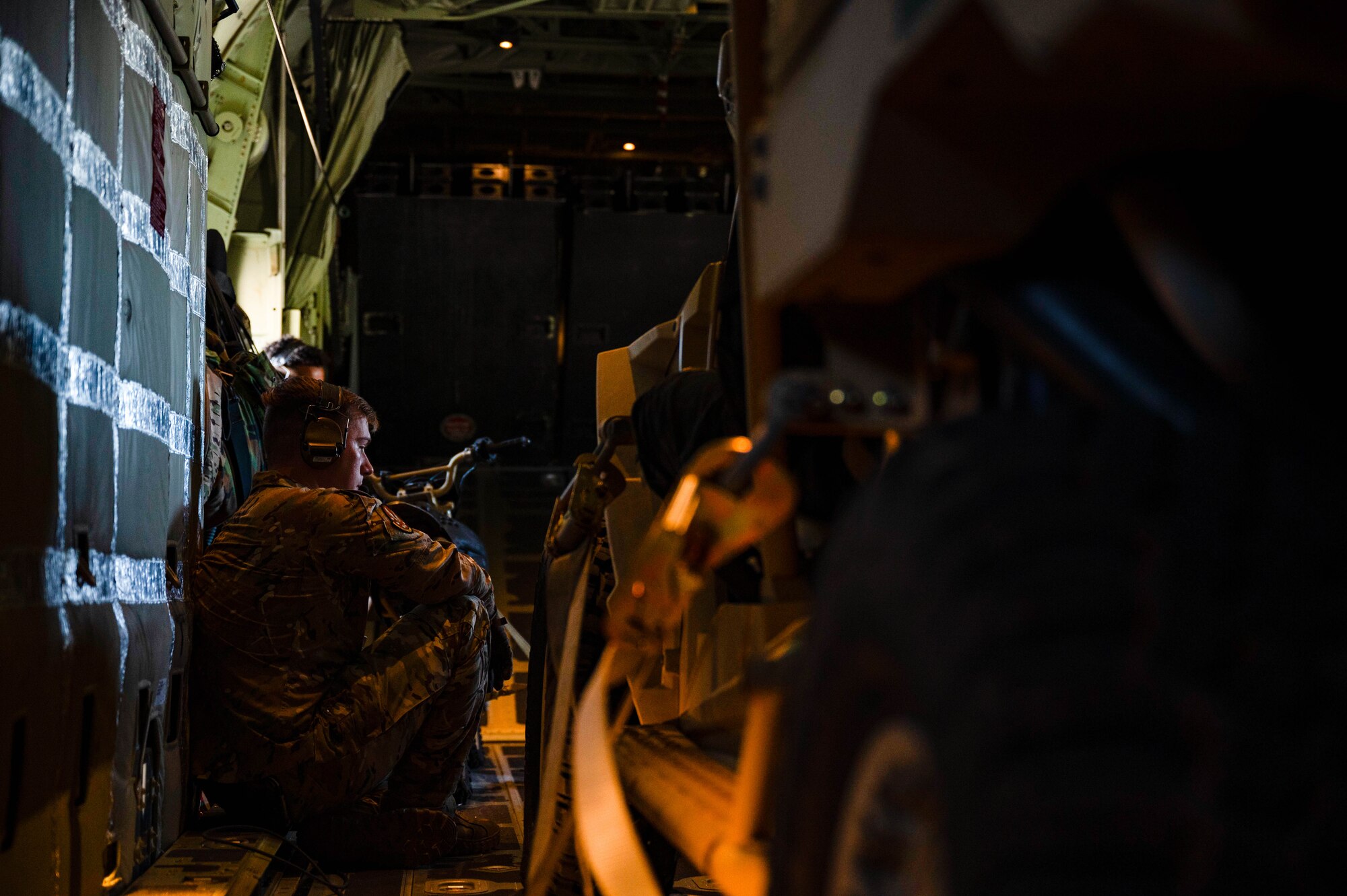 U.S. Air Force Matthew Seal, a 15th Special Operations Squadron special missions aviator, prepares for landing on an MC-130J Commando II during the Spirit of St. Louis Air Show at St. Louis Lambert International Airport, Missouri, June 8, 2024.