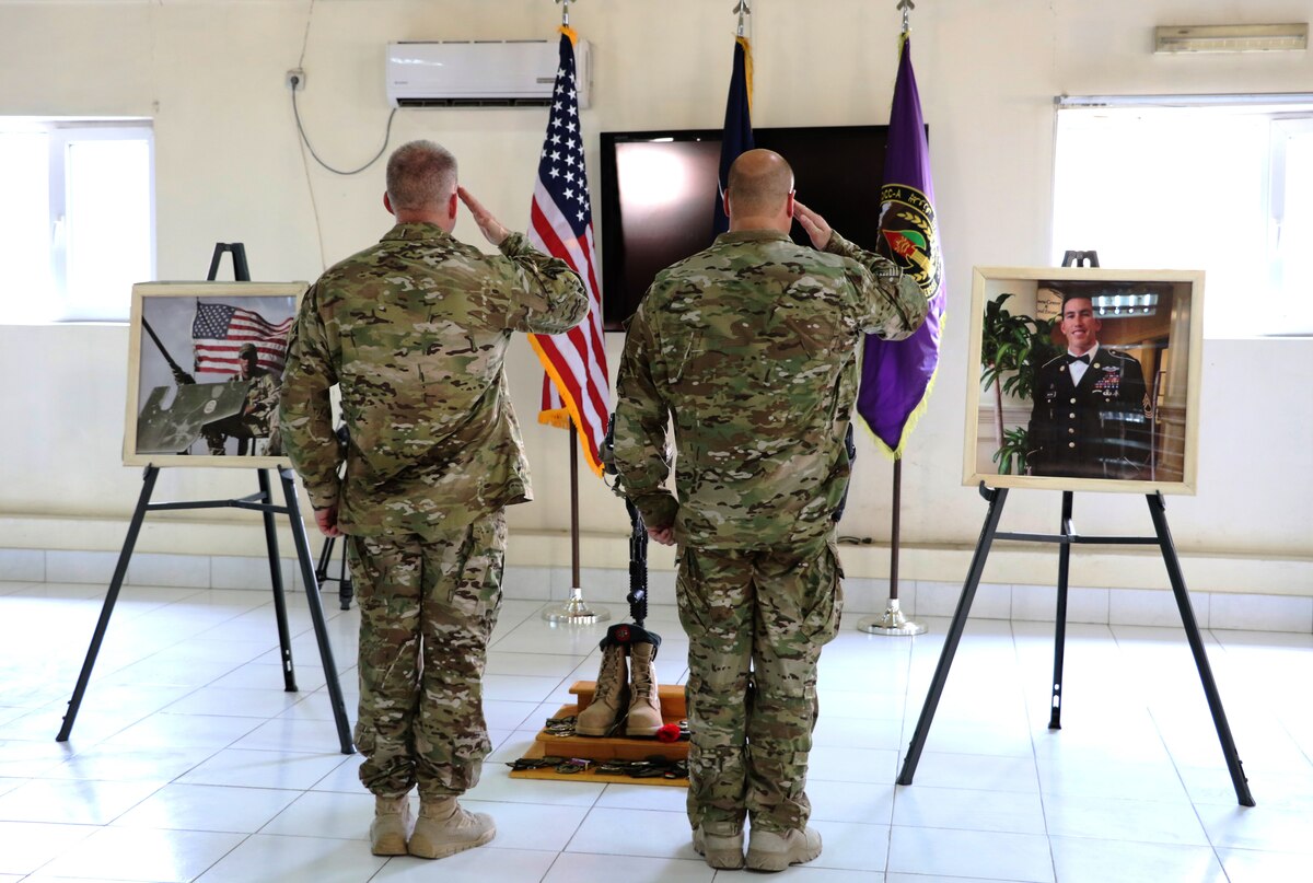 Coalition forces joined together to remember U.S. Army 1st Sgt. Peter "Drew" McKenna, Jr. during a memorial at Camp Integrity.