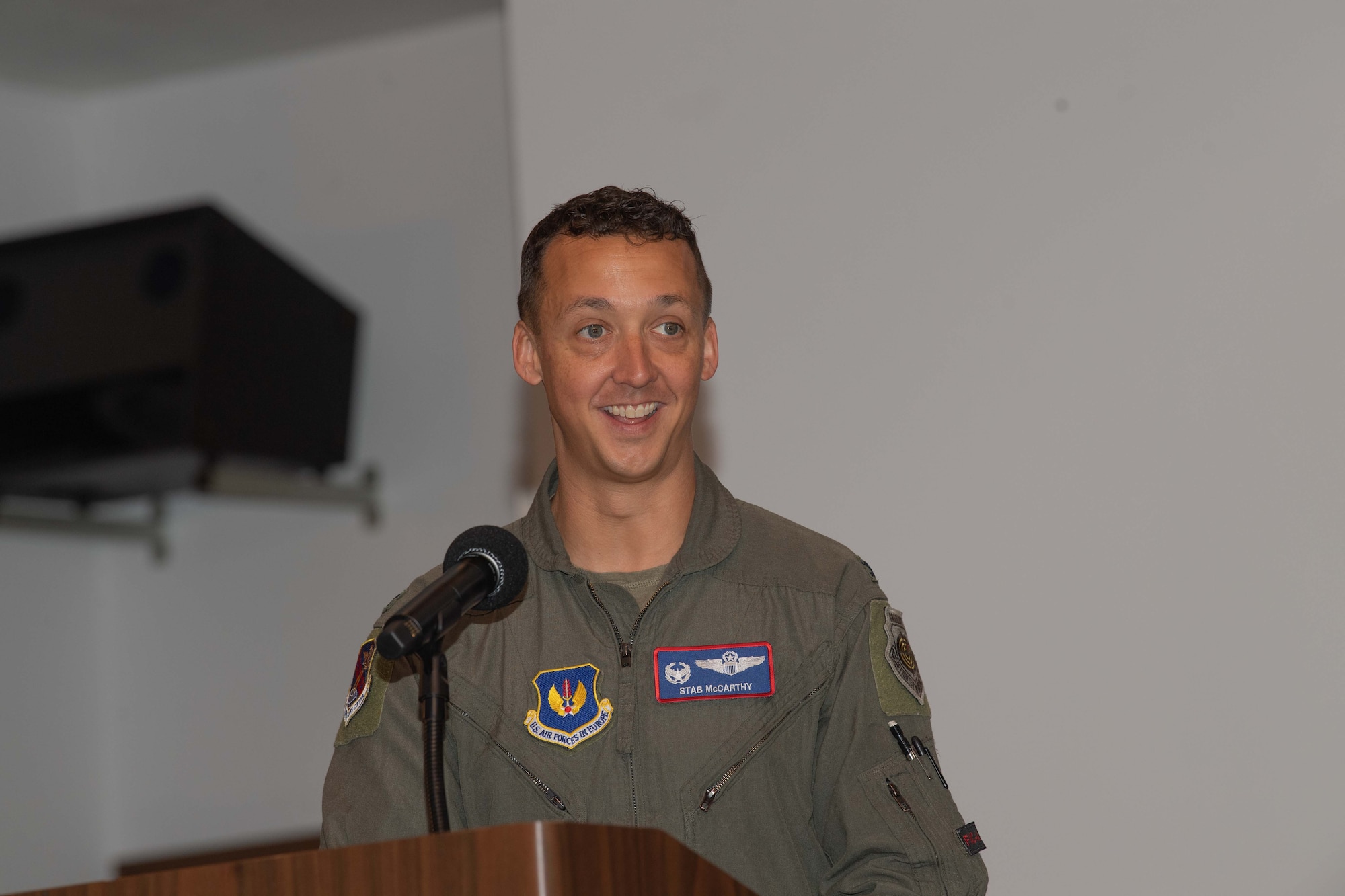 U.S. Air Force Col. Michael McCarthy, 603rd Air Operations Center incoming commander, provides opening remarks during the air operations center change of command ceremony at Ramstein Air Base, Germany, July 3rd, 2024.