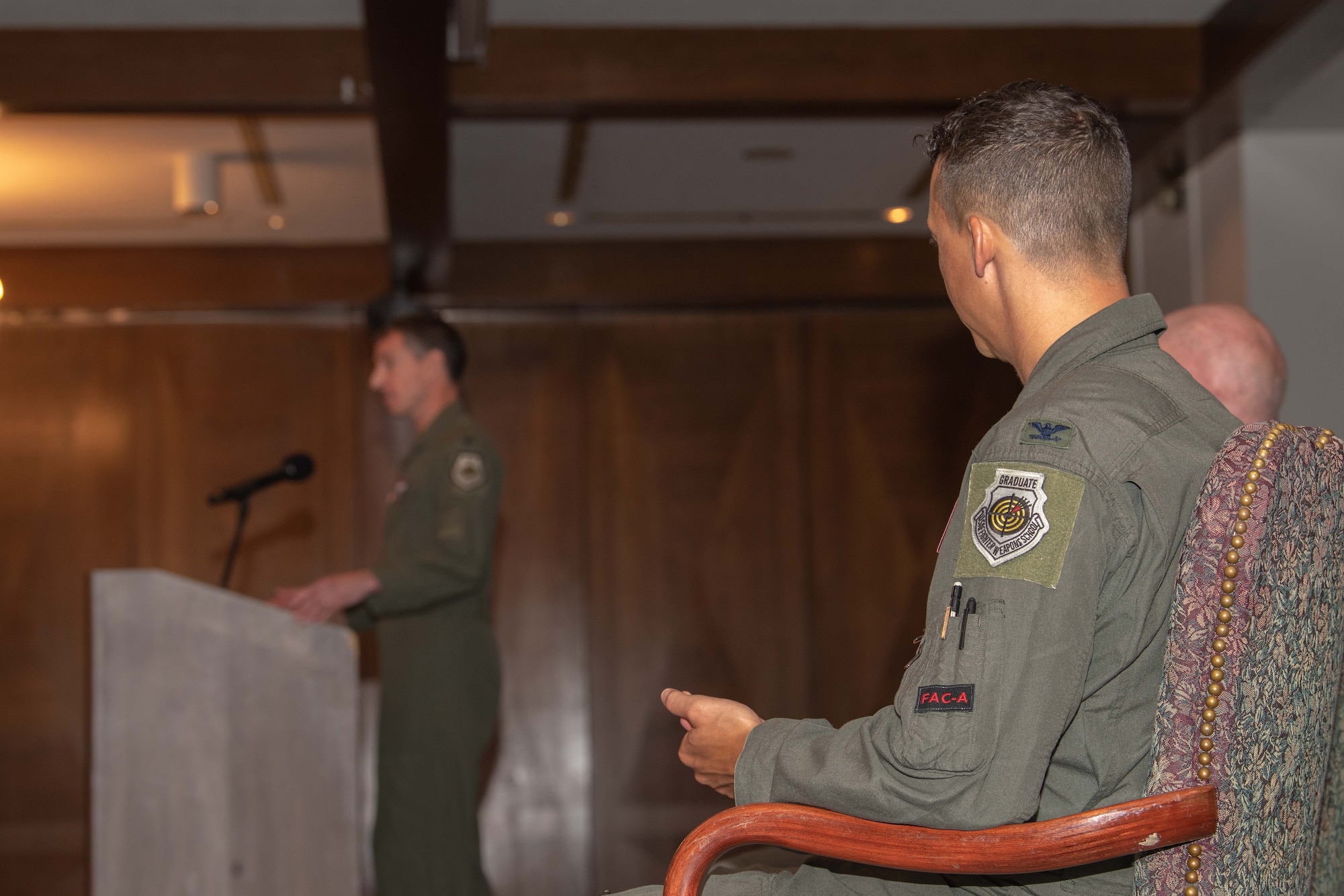 U.S. Air Force Col. Michael McCarthy, 603rd Air Operations Center incoming commander, listens to Col. Sean Lowe, 603rd AOC outgoing commander, give his final remarks during the air operations center’s change of command ceremony at Ramstein Air Base, Germany, July 3rd, 2024.