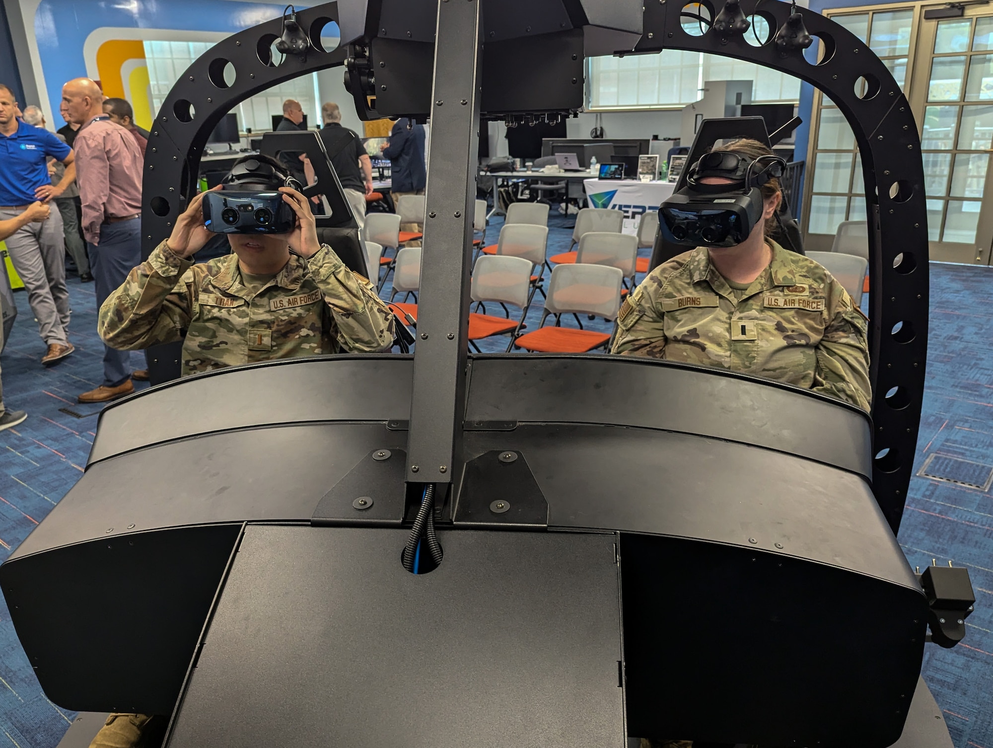 Individuals using simulators.