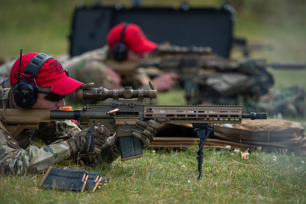 U.S. Air Force Airmen fire an M110A1 Squad Designated Marksmanship Rifle at Stanford Training Area.