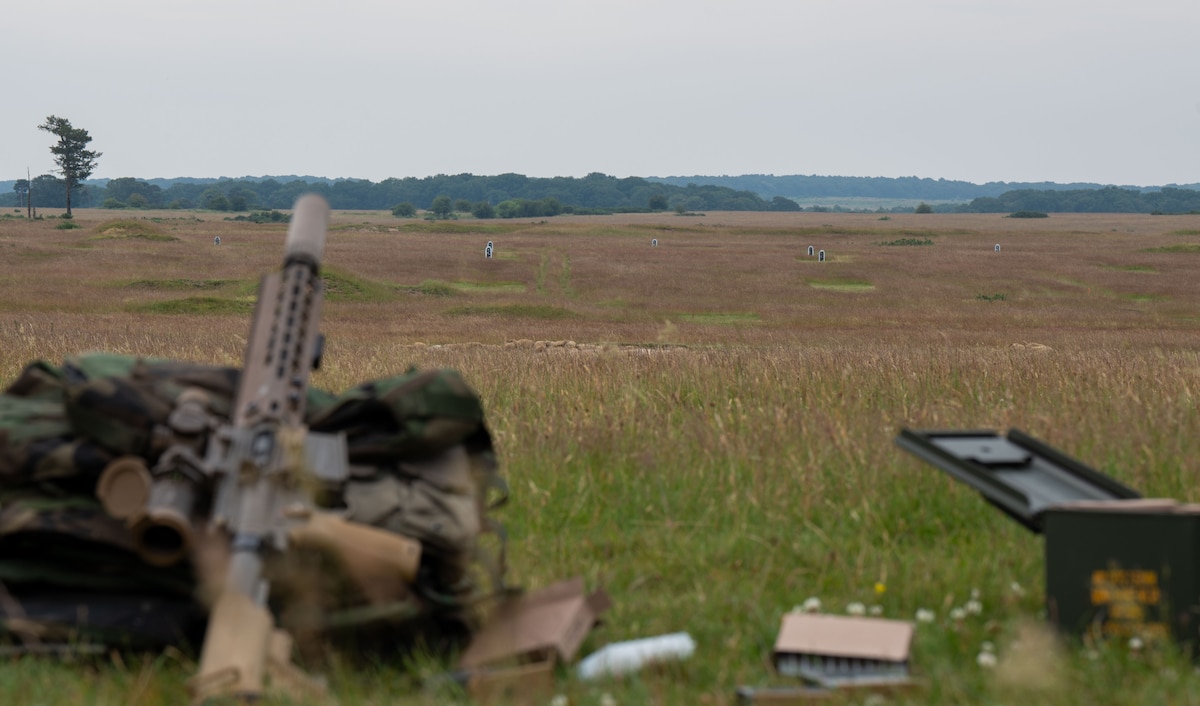 An M110A1 Squad Designated Marksmanship Rifle sits in line with targets at Stanford Training Area.