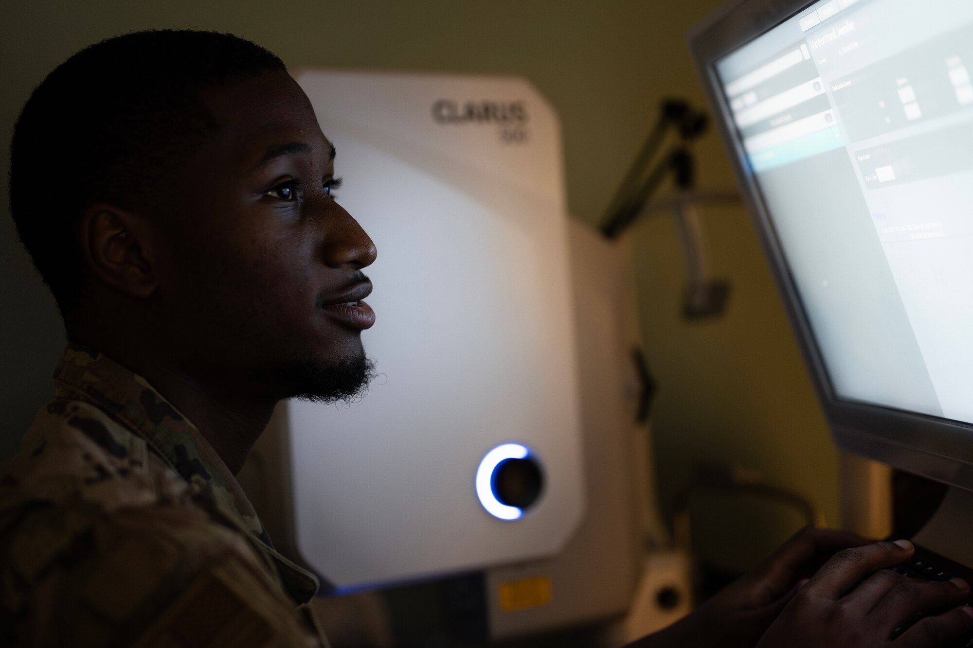 Senior Airman Jaylin Thomas, 5th Operational Medical Readiness Squadron optometry technician, takes a picture of a patient’s eye during an exam at the Optometry Clinic at Minot Air Force Base, North Dakota, June 28, 2024. Optometry specialists are trained to prescribe and fit lenses that will improve a patient’s vision as well as treat various eye diseases and disorders. (U.S. Air Force photo by Airman 1st Class Alyssa Bankston)