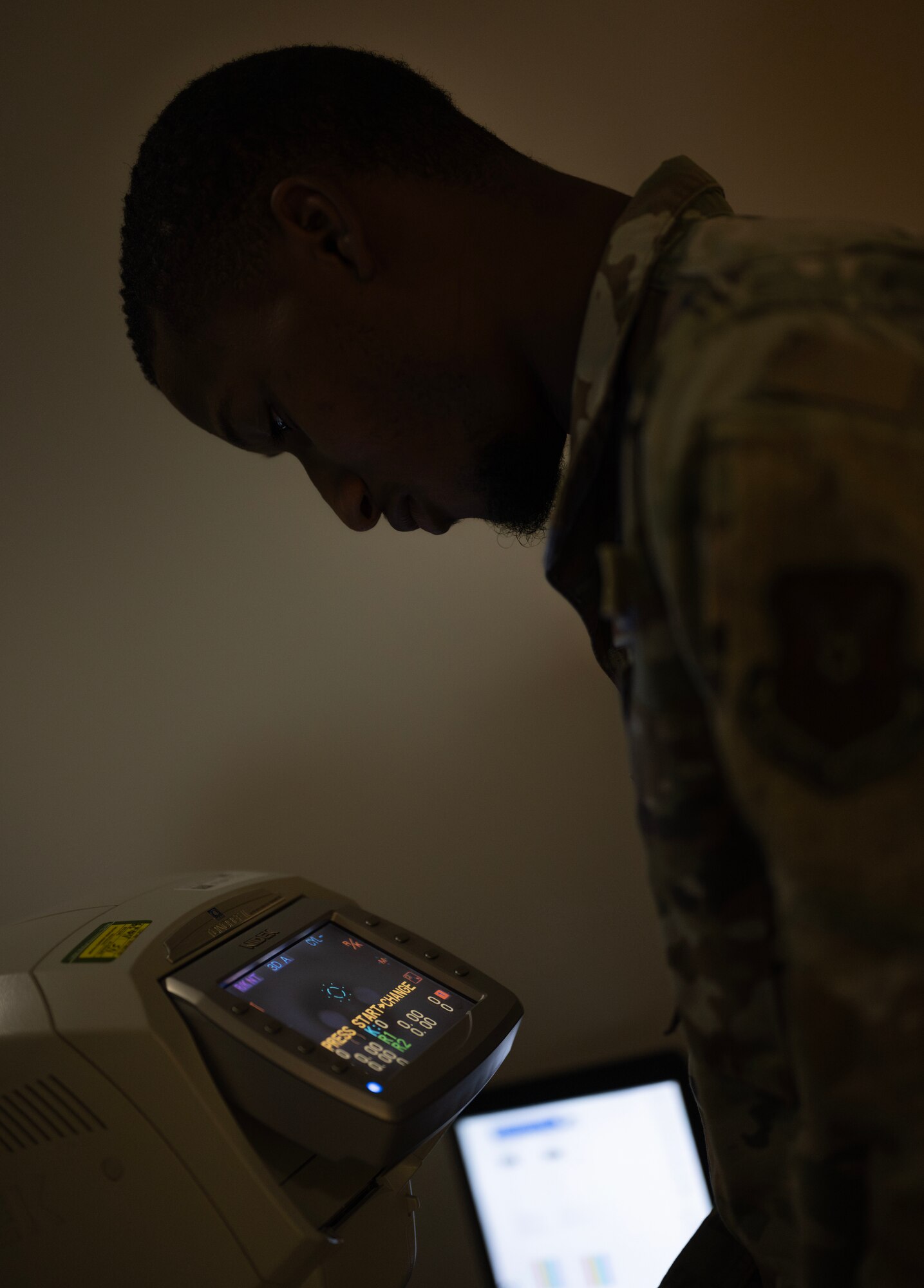 Senior Airman Jaylin Thomas, 5th Operational Medical Readiness Squadron optometry technician, takes a picture of a patient’s eye during an exam at the Optometry Clinic at Minot Air Force Base, North Dakota, June 28, 2024. Optometry specialists are trained to prescribe and fit lenses that will improve a patient’s vision as well as treat various eye diseases and disorders. (U.S. Air Force photo by Airman 1st Class Alyssa Bankston)