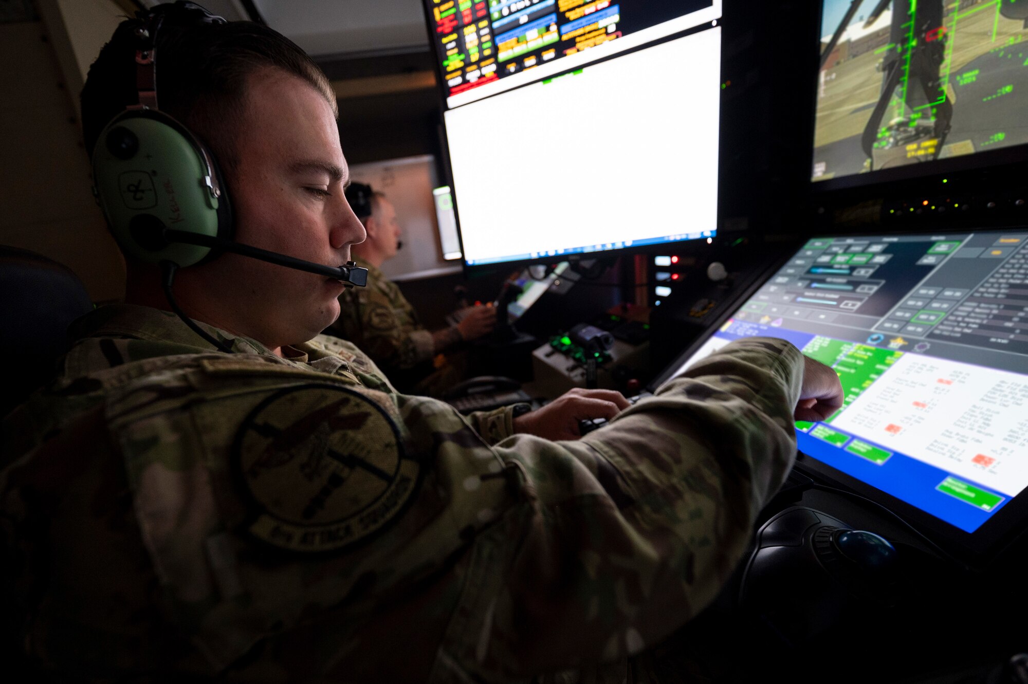 U.S. Air Force Staff Sgt. Nicholas Hughes, 6th Attack Squadron MQ-9 Reaper sensor operator student, inputs commands during MQ-9 launch training at Holloman Air Force Base, New Mexico, July 8, 2024.